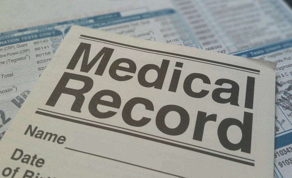 Reviewing case documents and medical records that factor into a settlement evaluation