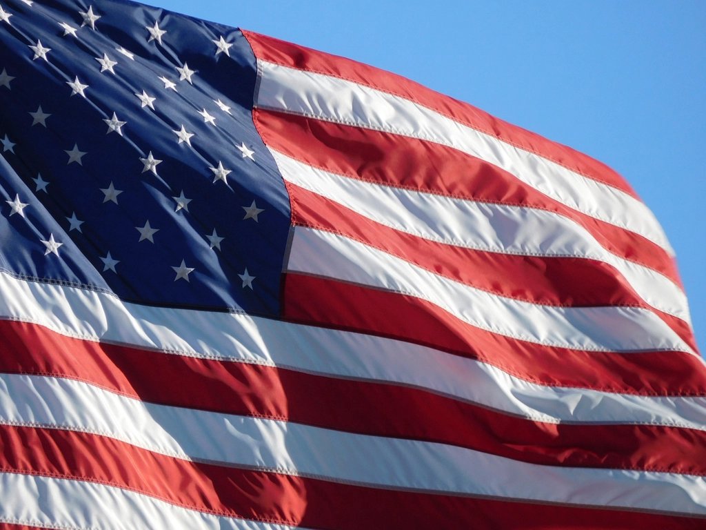 Close-up of an American flag, symbolizing U.S. immigration and green card applications
